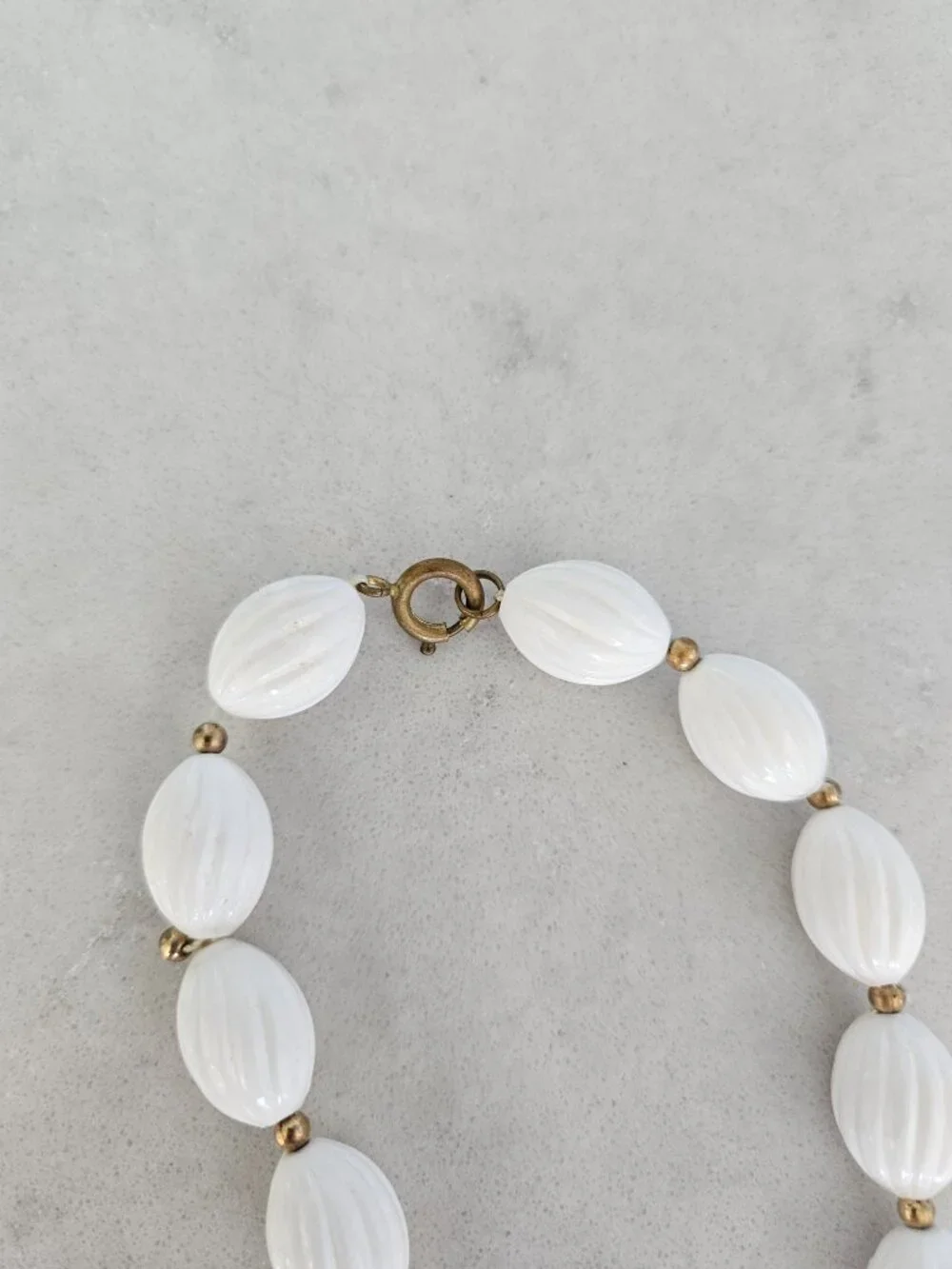 RARE AND VINTAGE WHITE RIBBED OVAL BEAD 48